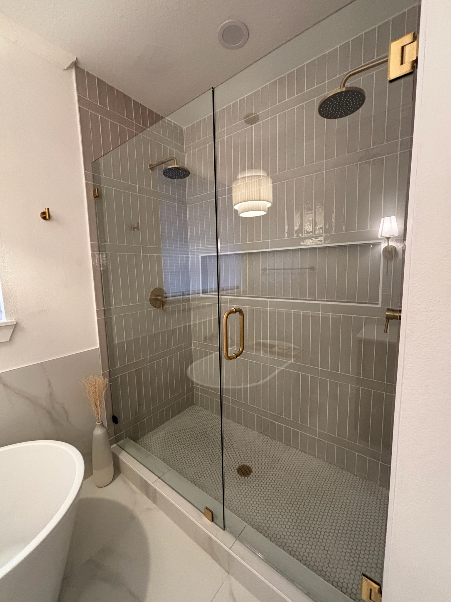 Dated bathroom before renovation - old fixtures and tile